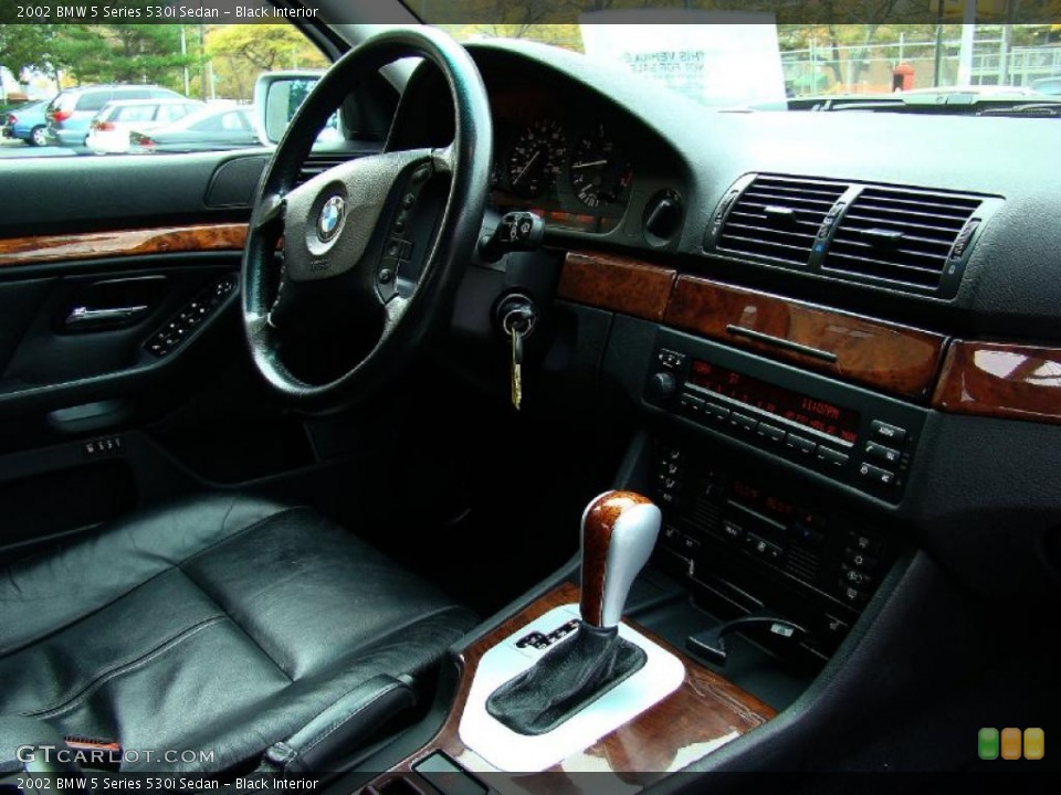 Black Interior Dashboard for the 2002 BMW 5 Series 530i Sedan #44733569