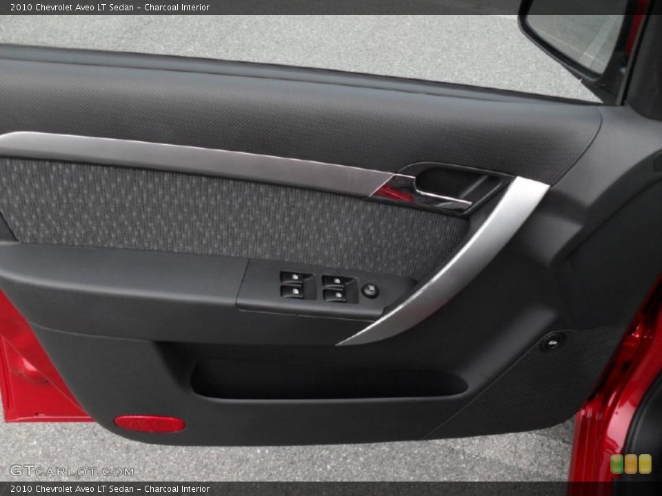 Charcoal Interior Door Panel for the 2010 Chevrolet Aveo LT Sedan #44750763
