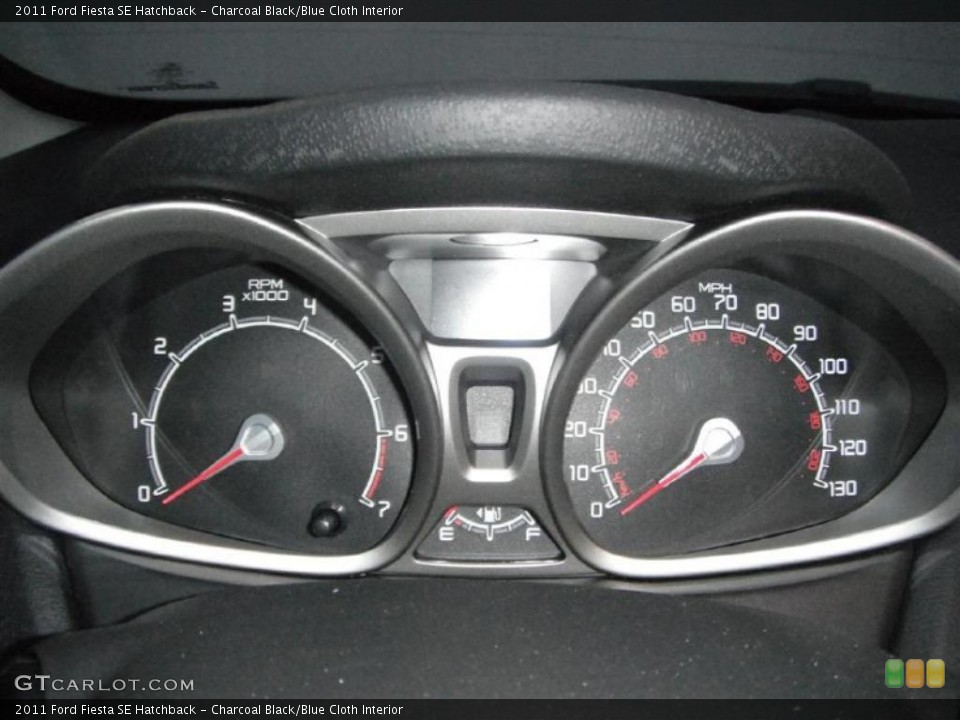 Charcoal Black/Blue Cloth Interior Gauges for the 2011 Ford Fiesta SE Hatchback #44757923