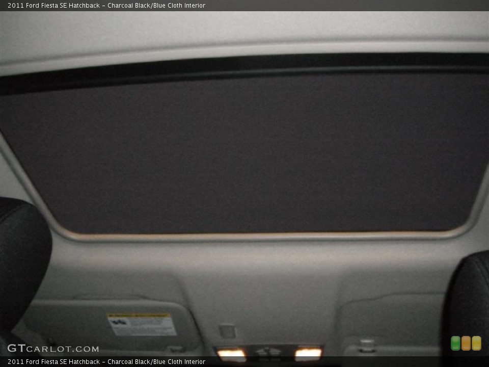 Charcoal Black/Blue Cloth Interior Sunroof for the 2011 Ford Fiesta SE Hatchback #44757939
