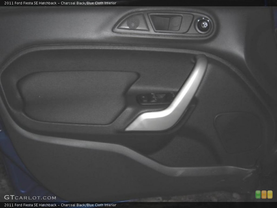 Charcoal Black/Blue Cloth Interior Door Panel for the 2011 Ford Fiesta SE Hatchback #44757963