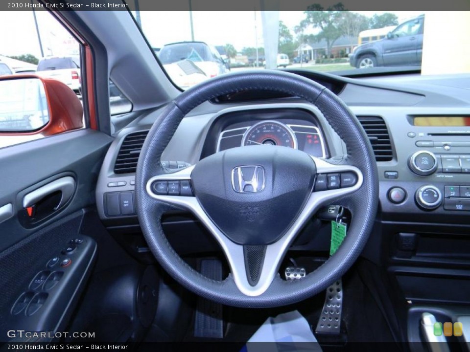 Black Interior Steering Wheel for the 2010 Honda Civic Si Sedan #44788902