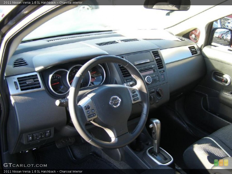 Charcoal Interior Dashboard for the 2011 Nissan Versa 1.8 SL Hatchback #44799614