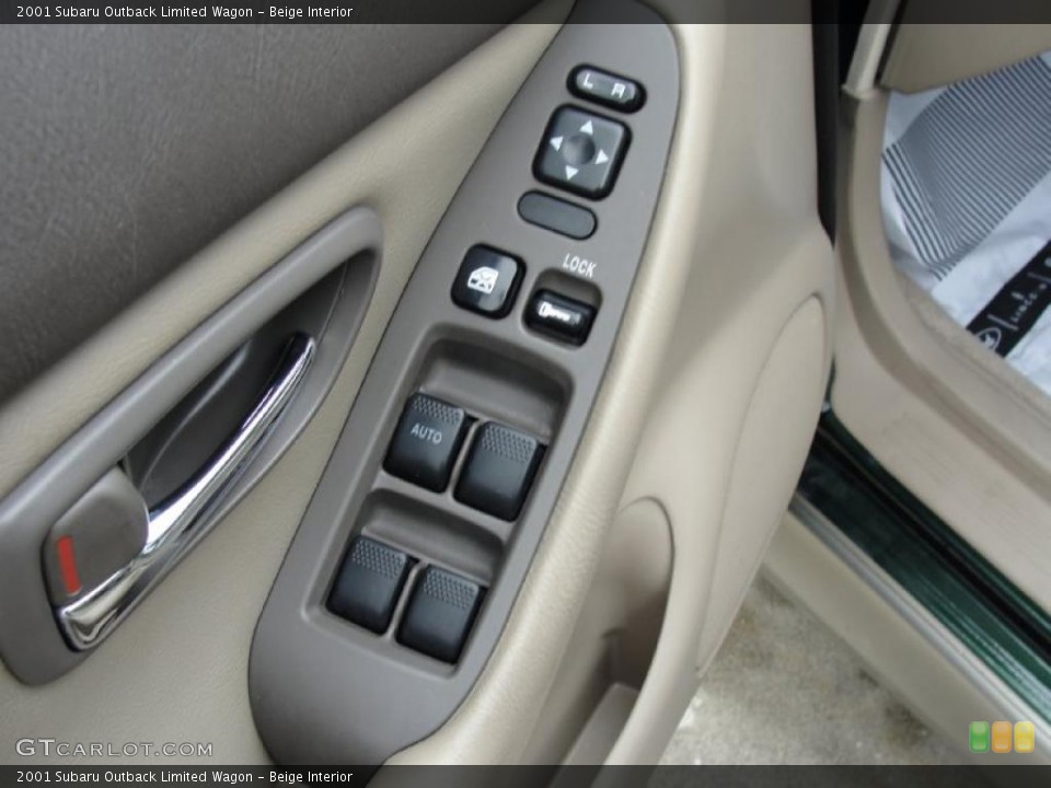 Beige Interior Controls for the 2001 Subaru Outback Limited Wagon #44818376