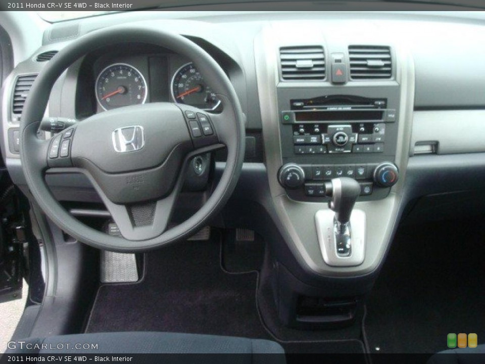 Black Interior Dashboard for the 2011 Honda CR-V SE 4WD #44836152