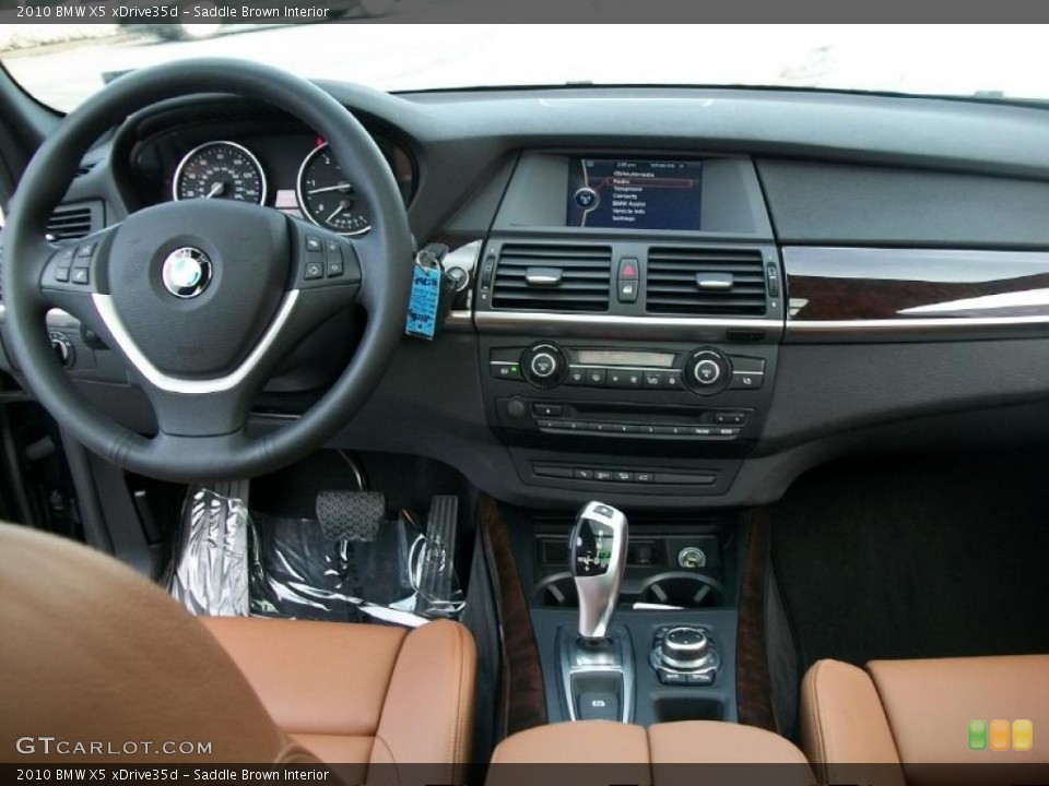 Saddle Brown Interior Dashboard for the 2010 BMW X5 xDrive35d #44850808