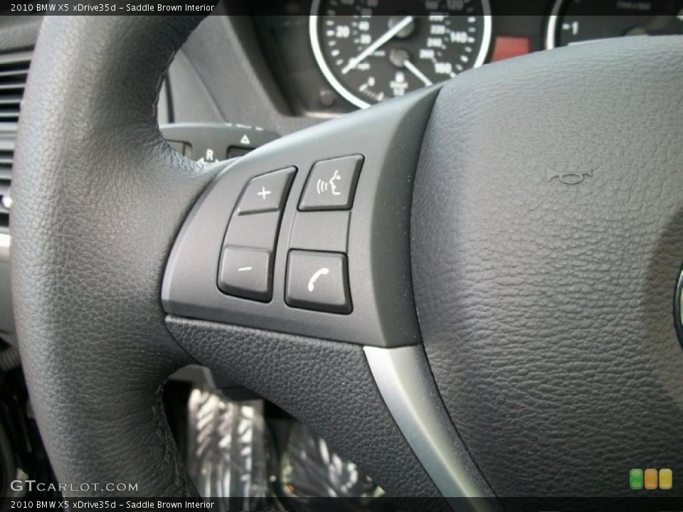 Saddle Brown Interior Controls for the 2010 BMW X5 xDrive35d #44850844
