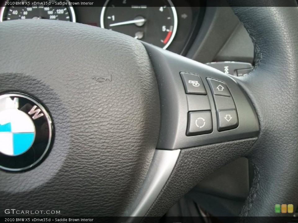 Saddle Brown Interior Controls for the 2010 BMW X5 xDrive35d #44850864