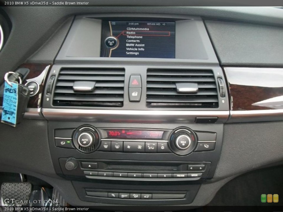 Saddle Brown Interior Controls for the 2010 BMW X5 xDrive35d #44850896