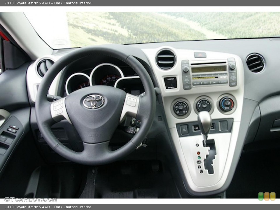 Dark Charcoal Interior Dashboard for the 2010 Toyota Matrix S AWD #44874669