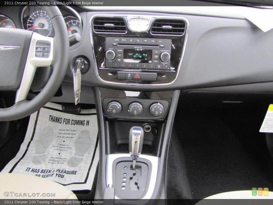 Black/Light Frost Beige Interior Dashboard for the 2011 Chrysler 200 Touring #44911703