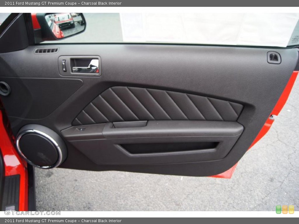 Charcoal Black Interior Door Panel for the 2011 Ford Mustang GT Premium Coupe #44919084