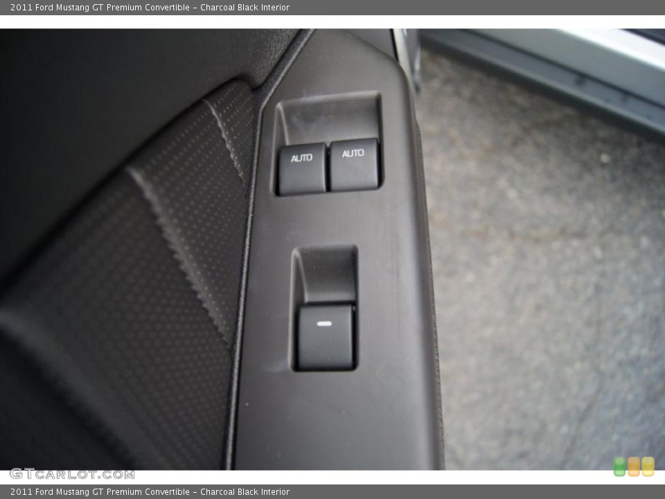 Charcoal Black Interior Controls for the 2011 Ford Mustang GT Premium Convertible #44919652