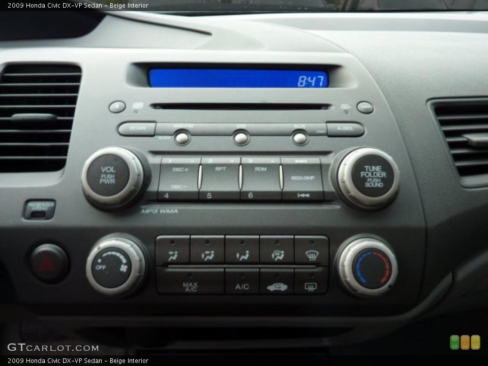 Beige Interior Controls for the 2009 Honda Civic DX-VP Sedan #44935645