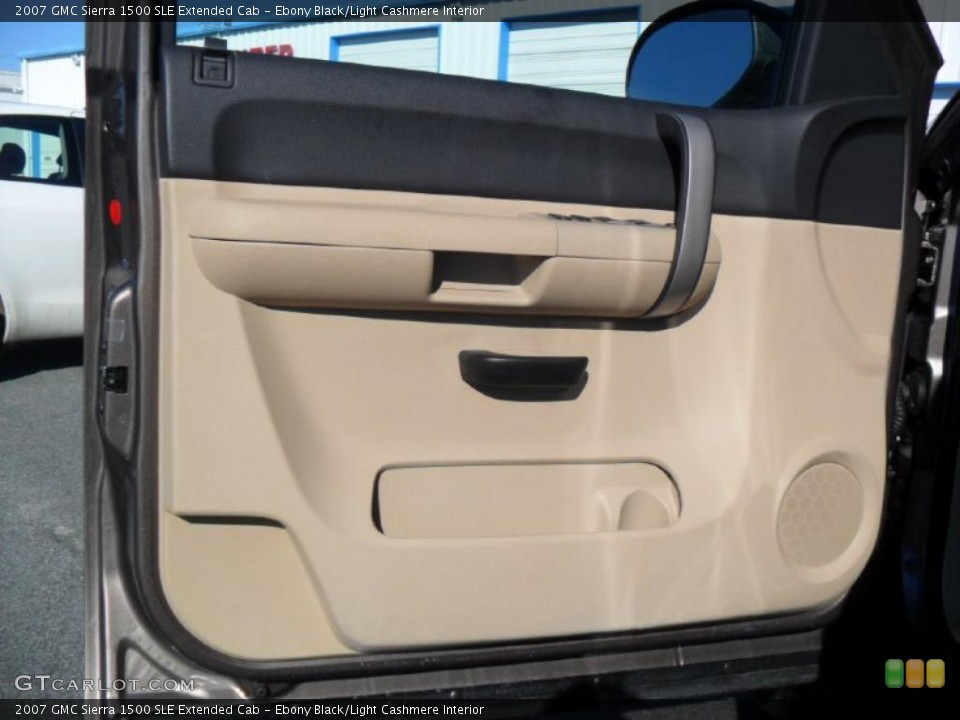 Ebony Black/Light Cashmere Interior Door Panel for the 2007 GMC Sierra 1500 SLE Extended Cab #44976621