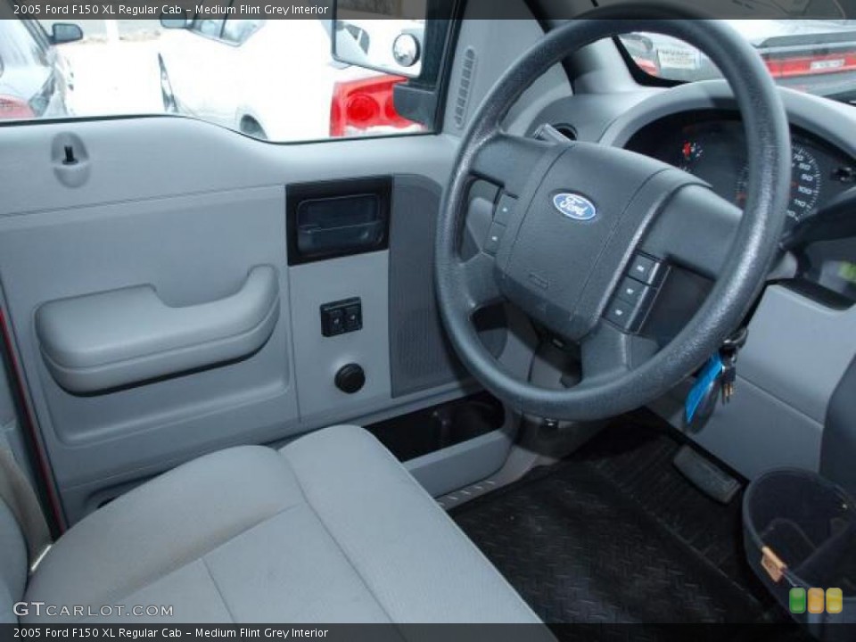 Medium Flint Grey Interior Steering Wheel for the 2005 Ford F150 XL Regular Cab #44978365