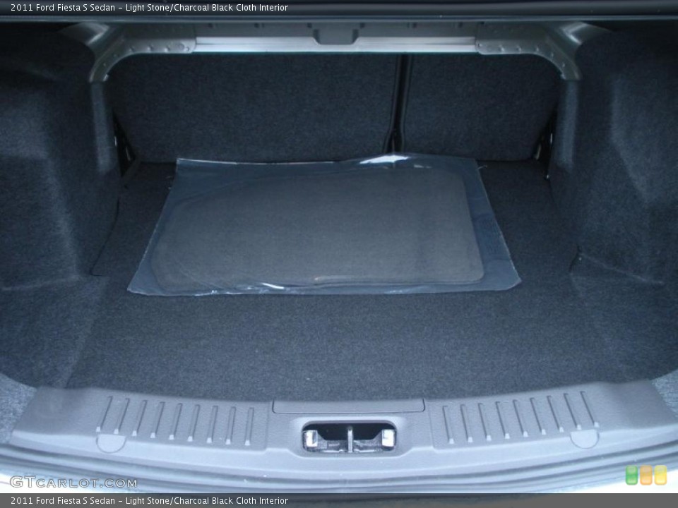 Light Stone/Charcoal Black Cloth Interior Trunk for the 2011 Ford Fiesta S Sedan #45001651