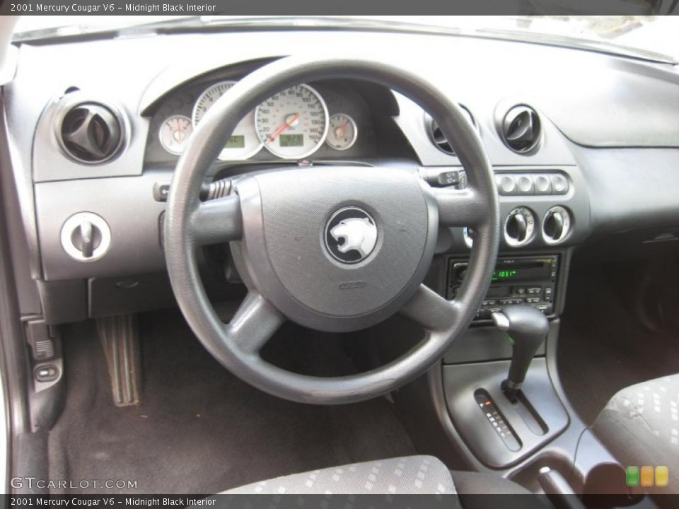 Midnight Black Interior Dashboard for the 2001 Mercury Cougar V6 #45004500