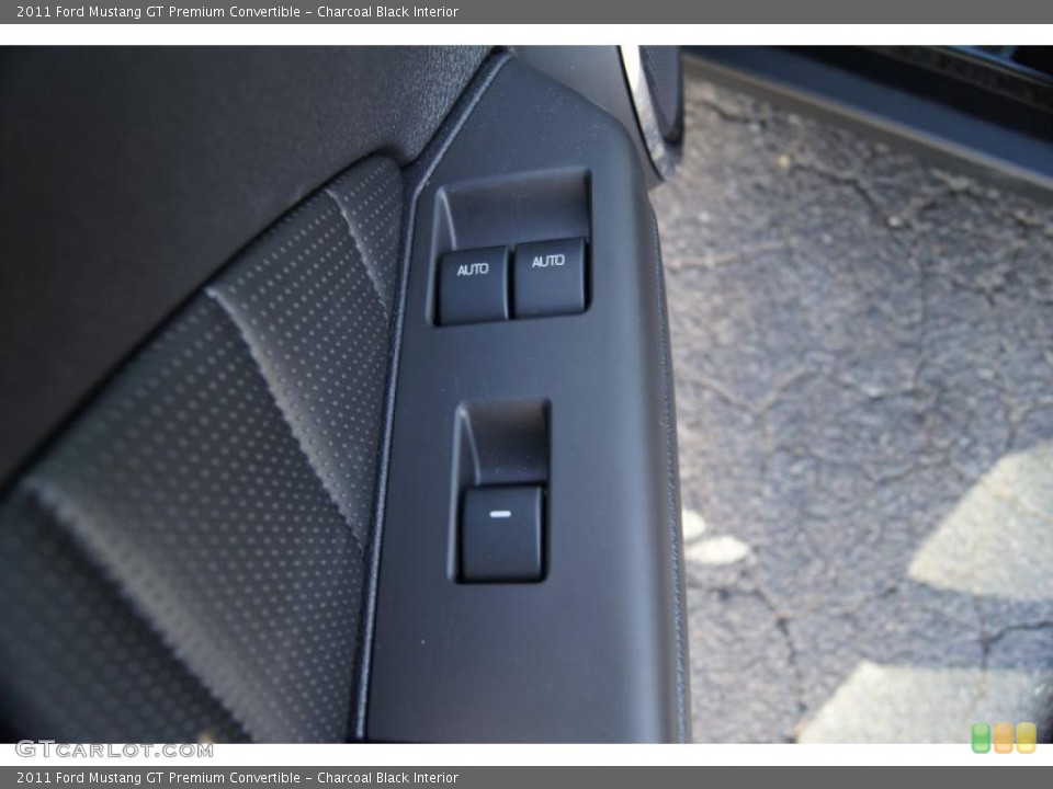 Charcoal Black Interior Controls for the 2011 Ford Mustang GT Premium Convertible #45007560
