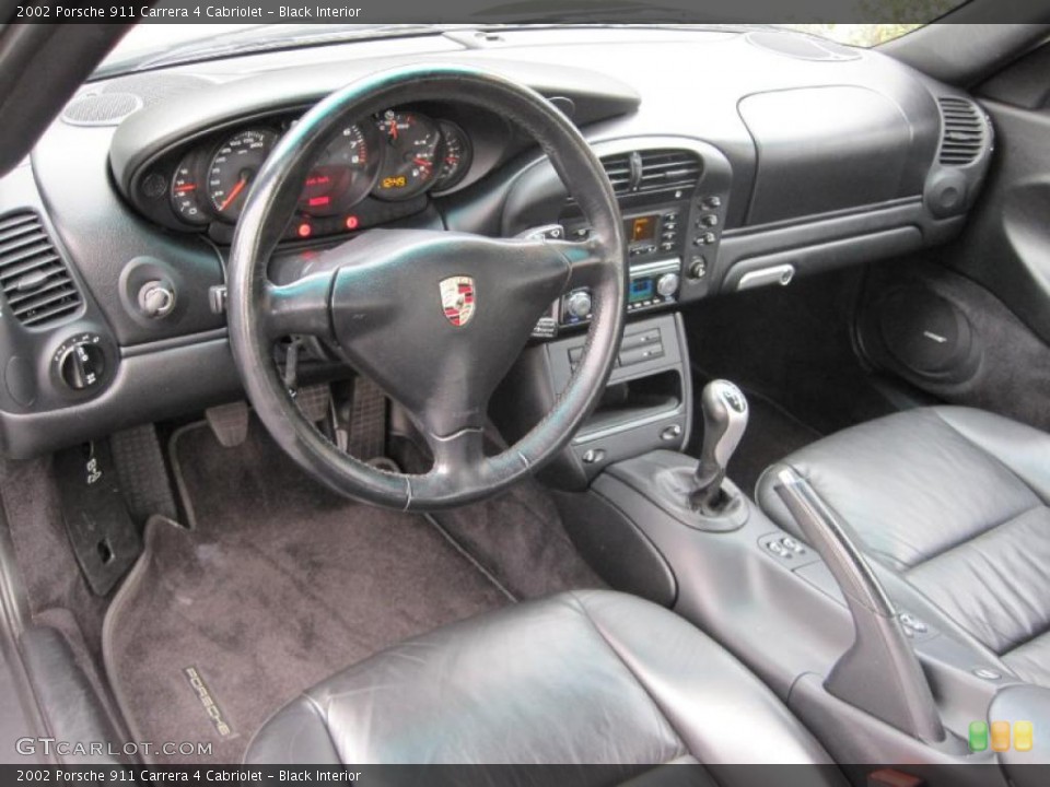 Black Interior Prime Interior for the 2002 Porsche 911 Carrera 4 Cabriolet #45058469