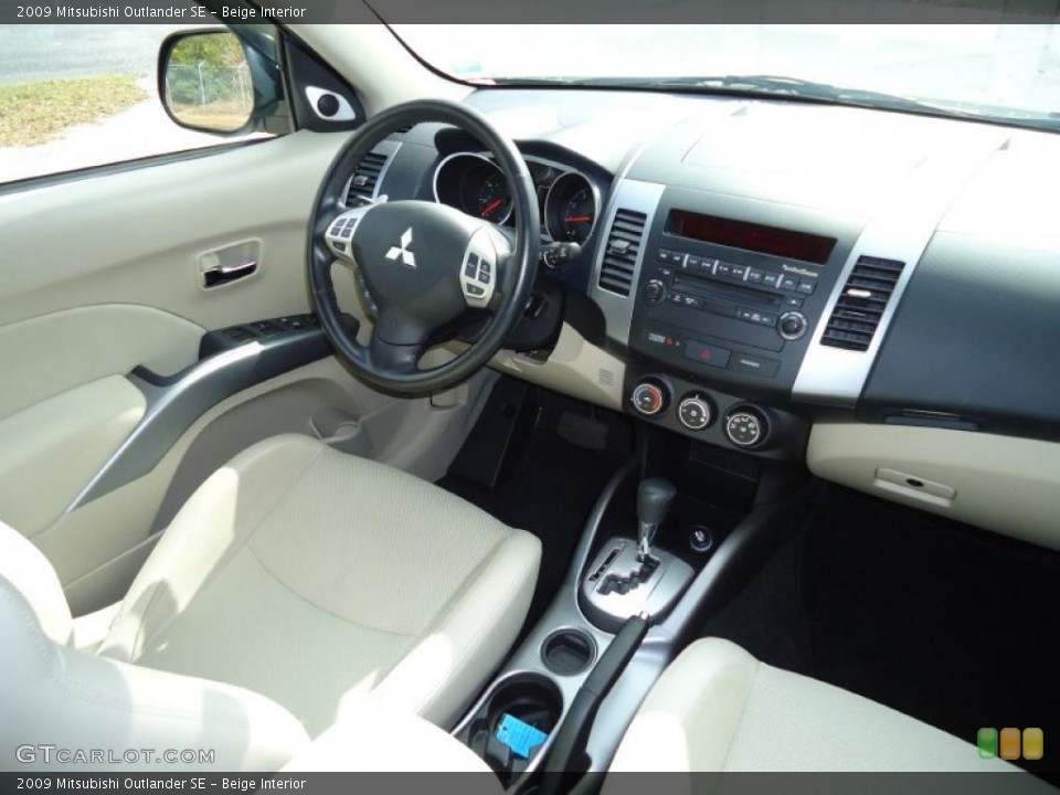 Beige Interior Dashboard for the 2009 Mitsubishi Outlander SE #45065105