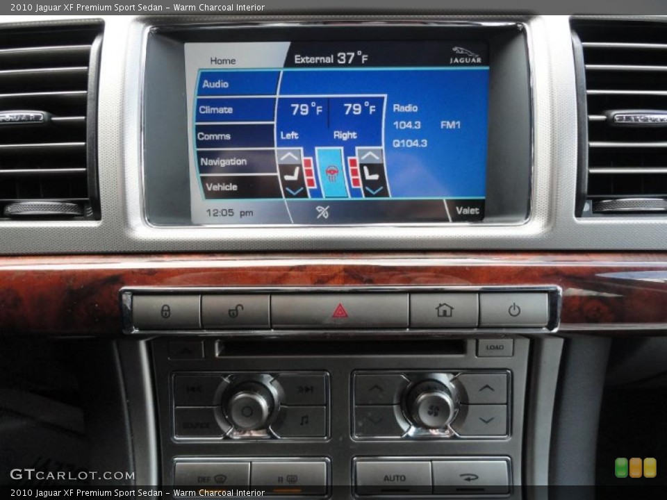 Warm Charcoal Interior Controls for the 2010 Jaguar XF Premium Sport Sedan #45088757