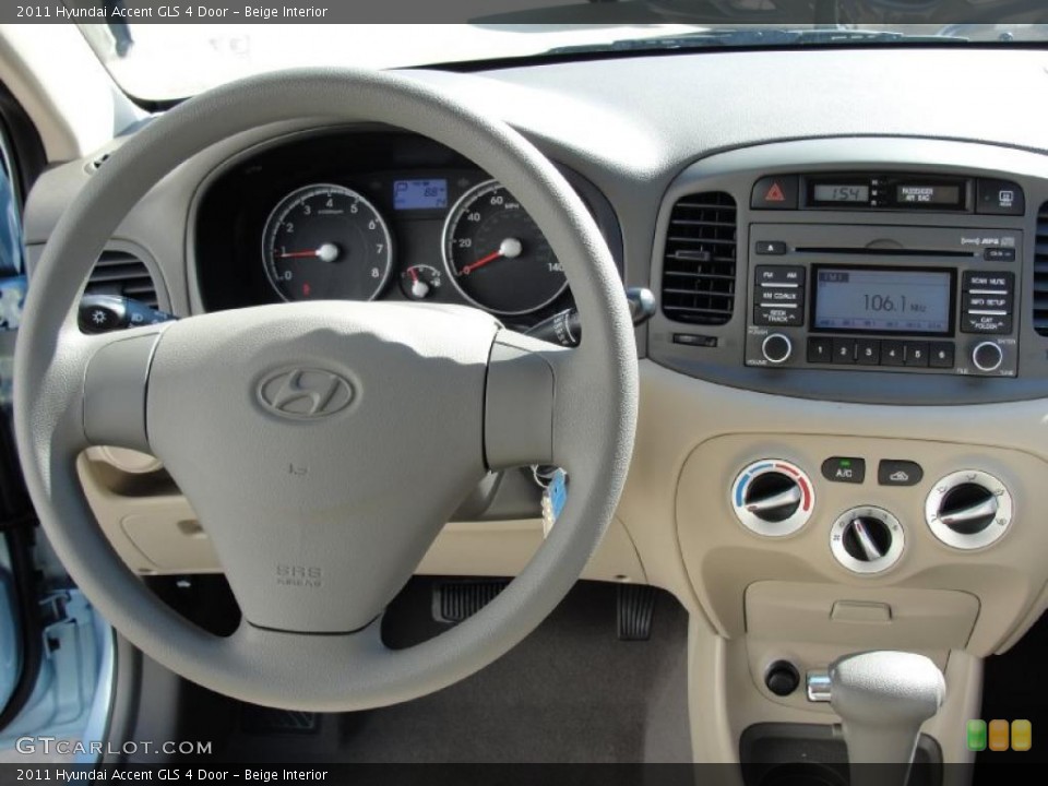 Beige Interior Dashboard for the 2011 Hyundai Accent GLS 4 Door #45100938