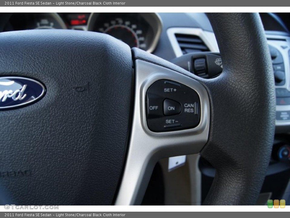 Light Stone/Charcoal Black Cloth Interior Controls for the 2011 Ford Fiesta SE Sedan #45114569