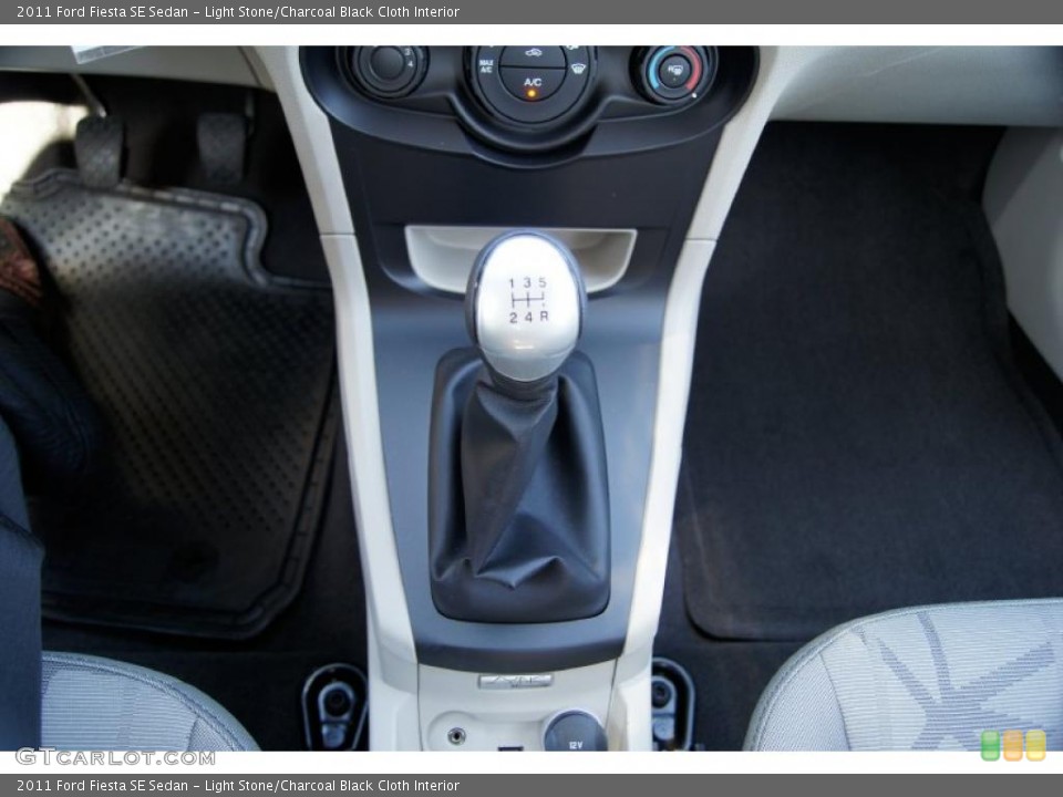 Light Stone/Charcoal Black Cloth Interior Transmission for the 2011 Ford Fiesta SE Sedan #45114653