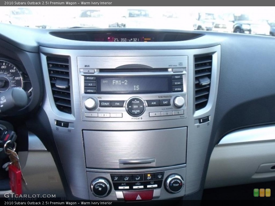 Warm Ivory Interior Controls for the 2010 Subaru Outback 2.5i Premium Wagon #45124158