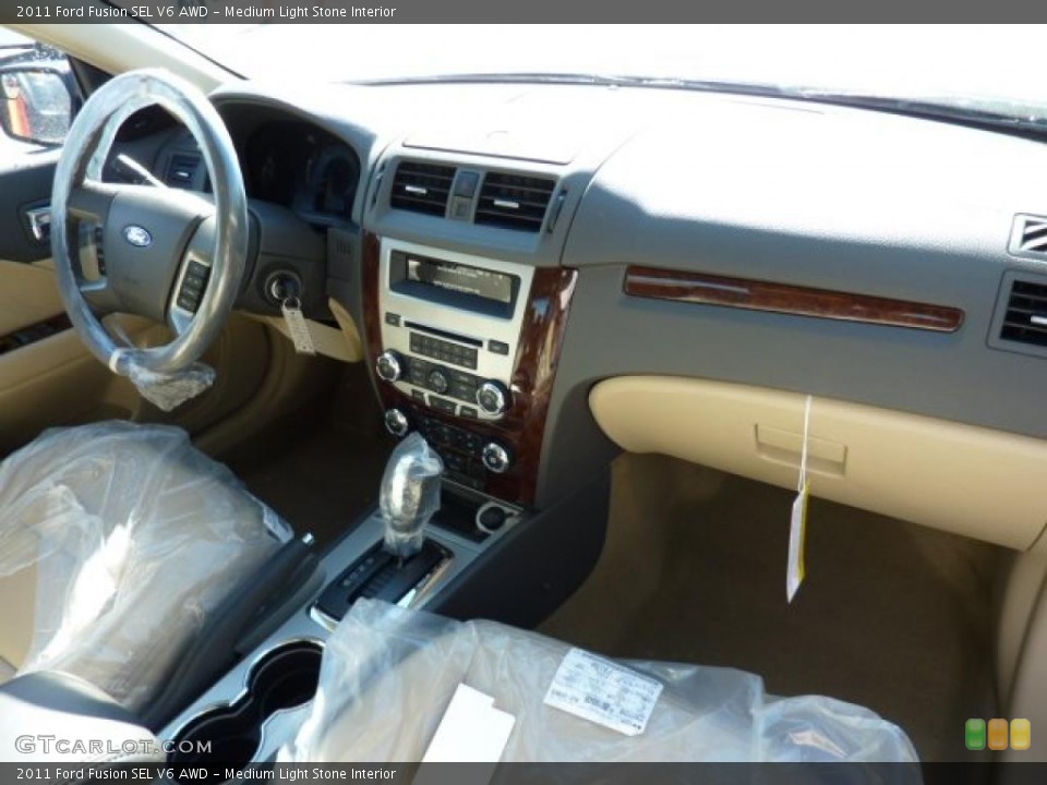 Medium Light Stone Interior Dashboard for the 2011 Ford Fusion SEL V6 AWD #45173596