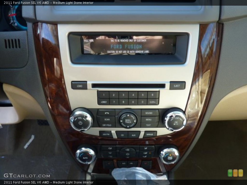 Medium Light Stone Interior Controls for the 2011 Ford Fusion SEL V6 AWD #45173624