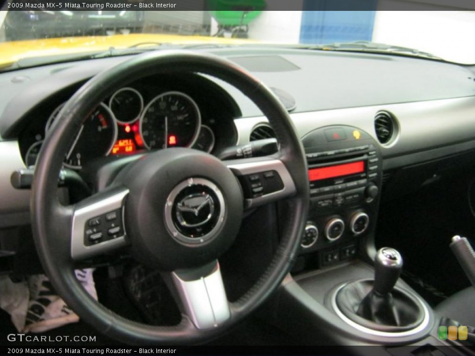 Black Interior Dashboard for the 2009 Mazda MX-5 Miata Touring Roadster #45190769