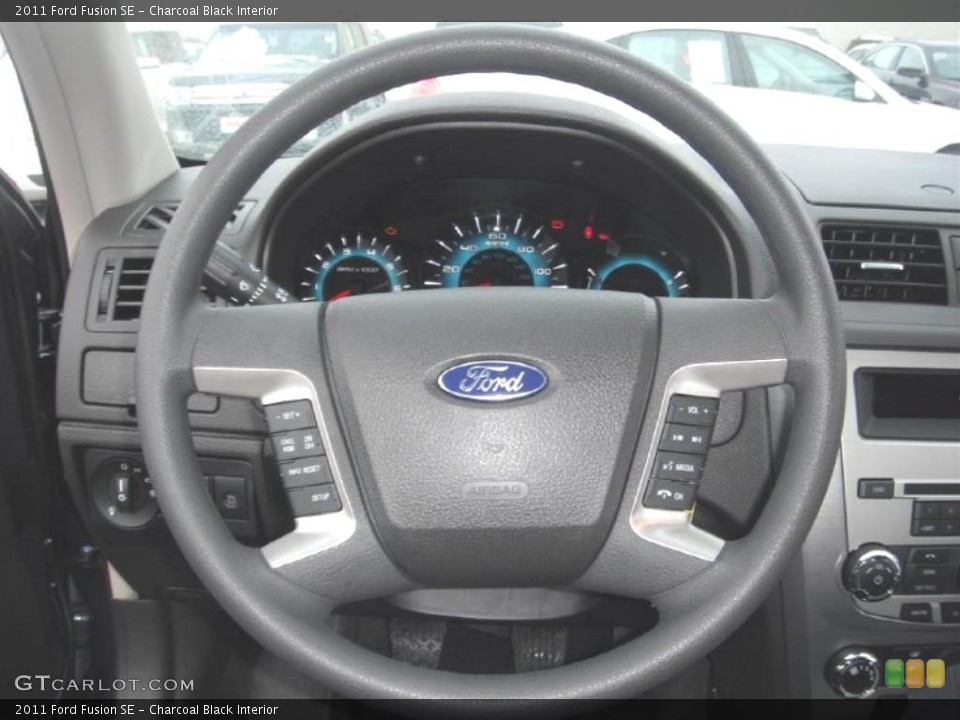 Charcoal Black Interior Steering Wheel for the 2011 Ford Fusion SE #45254444
