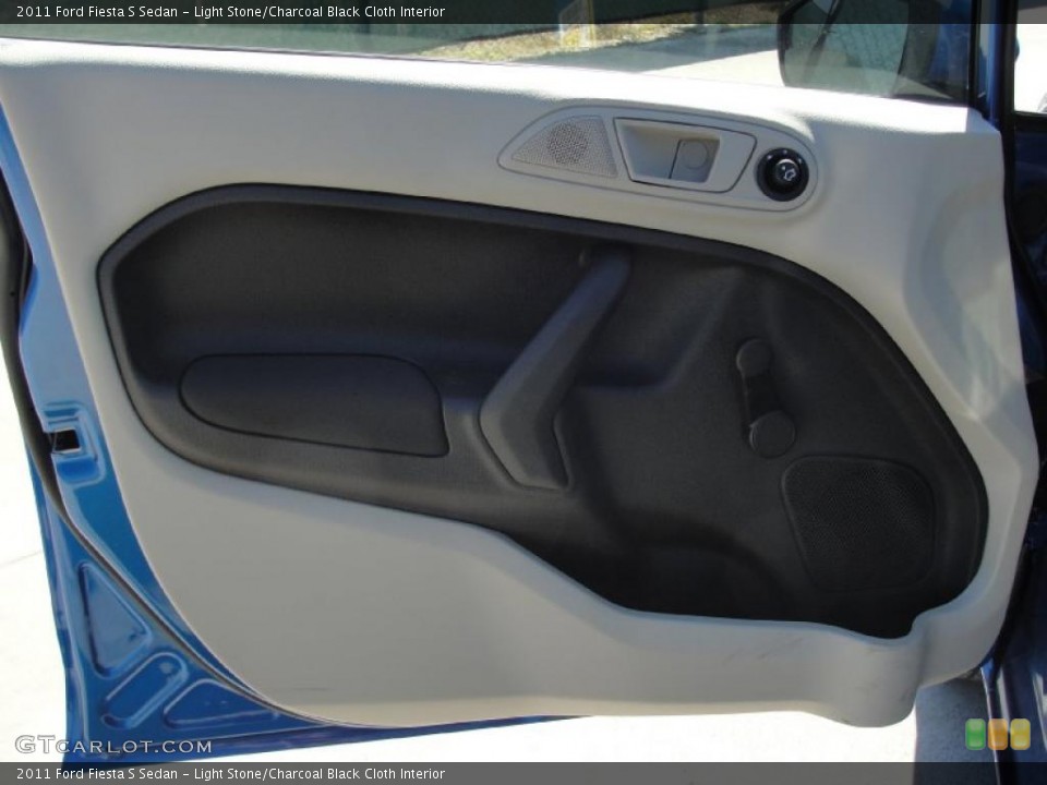 Light Stone/Charcoal Black Cloth Interior Door Panel for the 2011 Ford Fiesta S Sedan #45258167