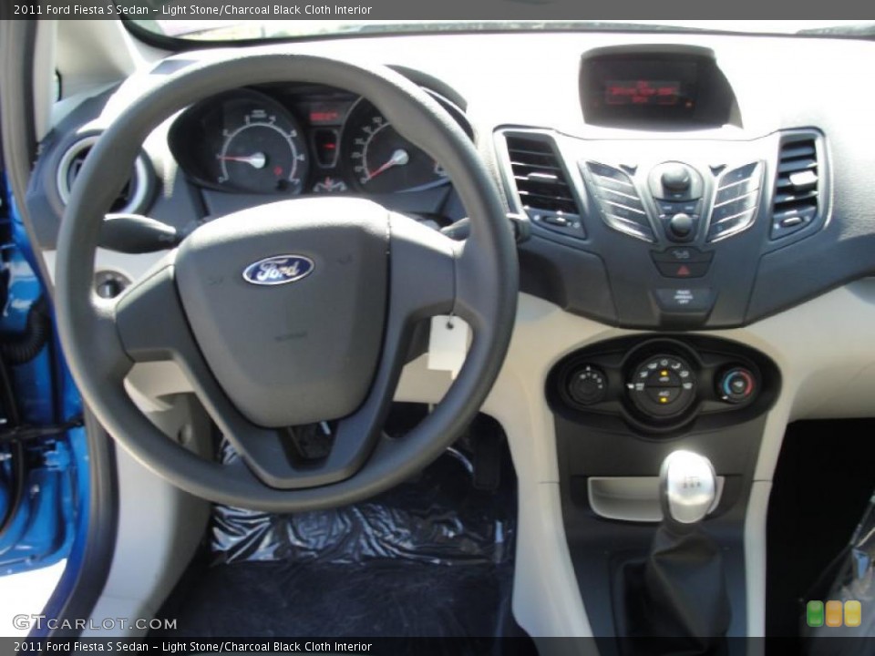 Light Stone/Charcoal Black Cloth Interior Dashboard for the 2011 Ford Fiesta S Sedan #45258183