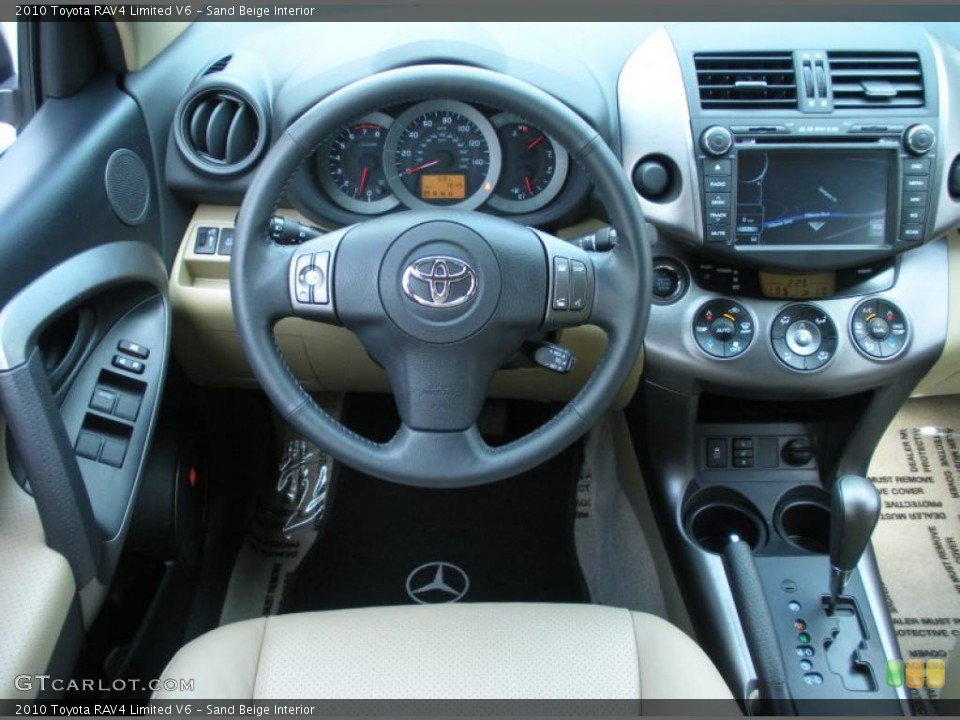 Sand Beige Interior Controls for the 2010 Toyota RAV4 Limited V6 #45261212