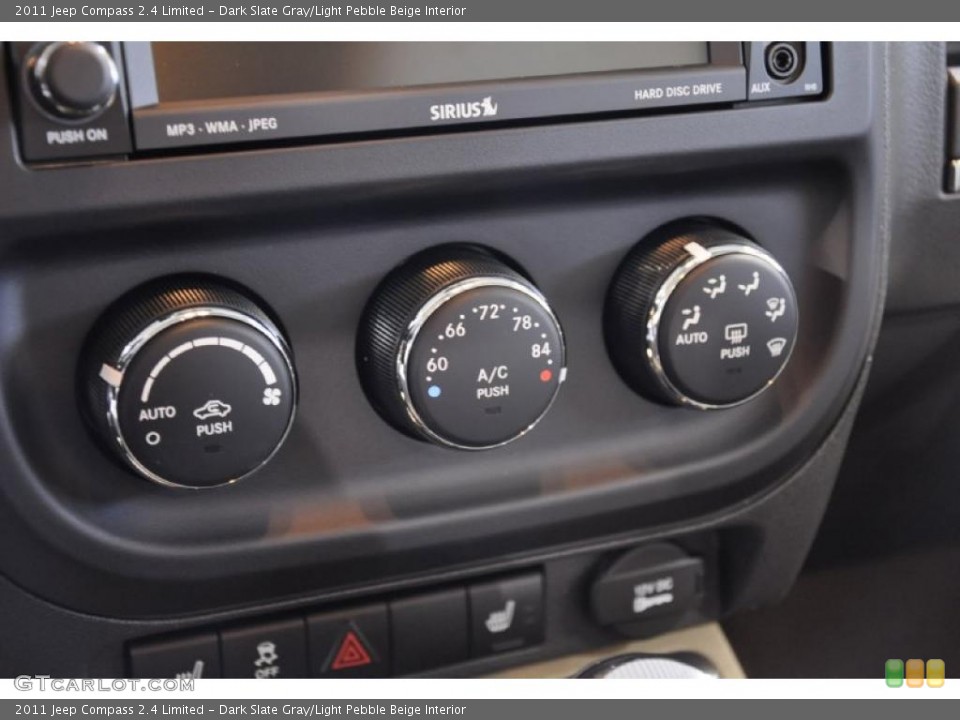 Dark Slate Gray/Light Pebble Beige Interior Controls for the 2011 Jeep Compass 2.4 Limited #45326339