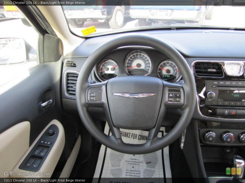Black/Light Frost Beige Interior Steering Wheel for the 2011 Chrysler 200 LX #45345069