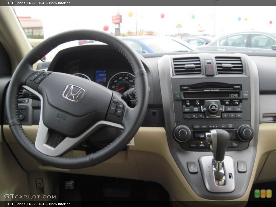 Ivory Interior Dashboard for the 2011 Honda CR-V EX-L #45345313