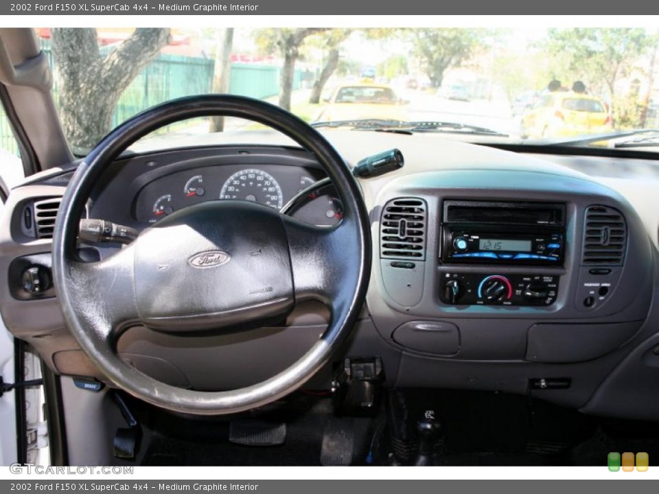 Medium Graphite Interior Dashboard for the 2002 Ford F150 XL SuperCab 4x4 #45365143