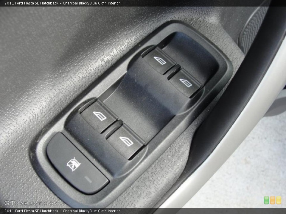 Charcoal Black/Blue Cloth Interior Controls for the 2011 Ford Fiesta SE Hatchback #45370502