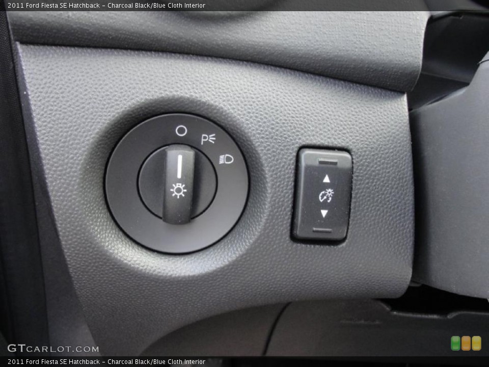 Charcoal Black/Blue Cloth Interior Controls for the 2011 Ford Fiesta SE Hatchback #45370566