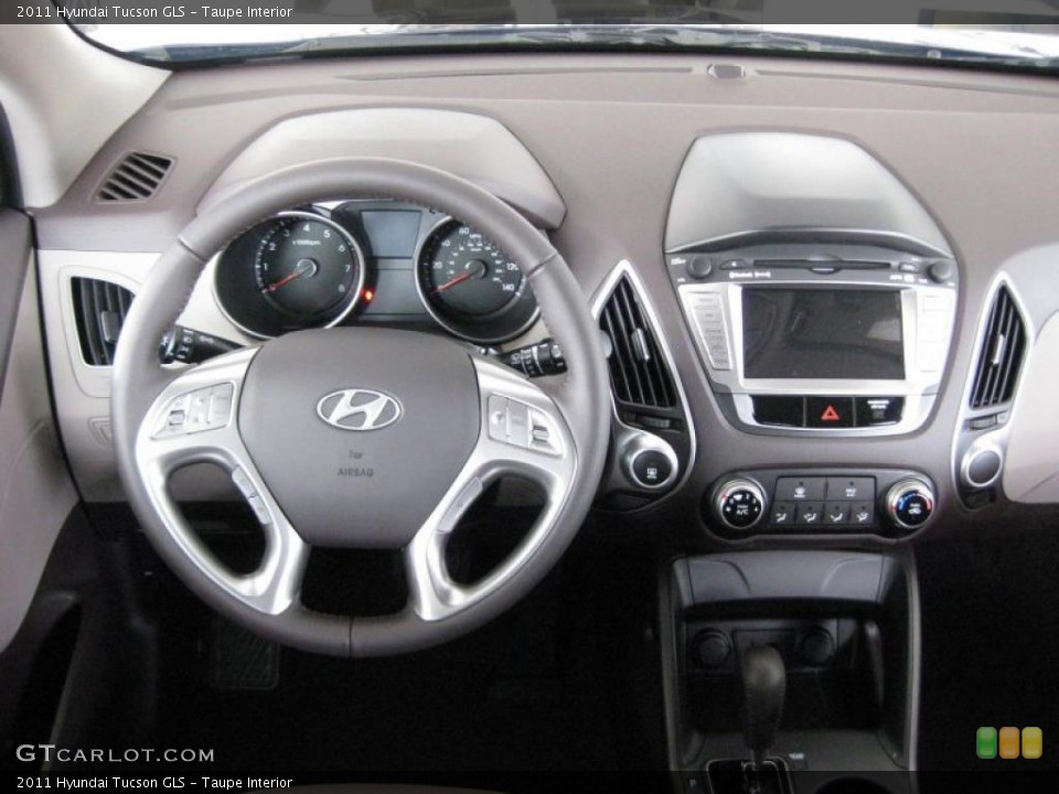 Taupe Interior Dashboard for the 2011 Hyundai Tucson GLS #45370797