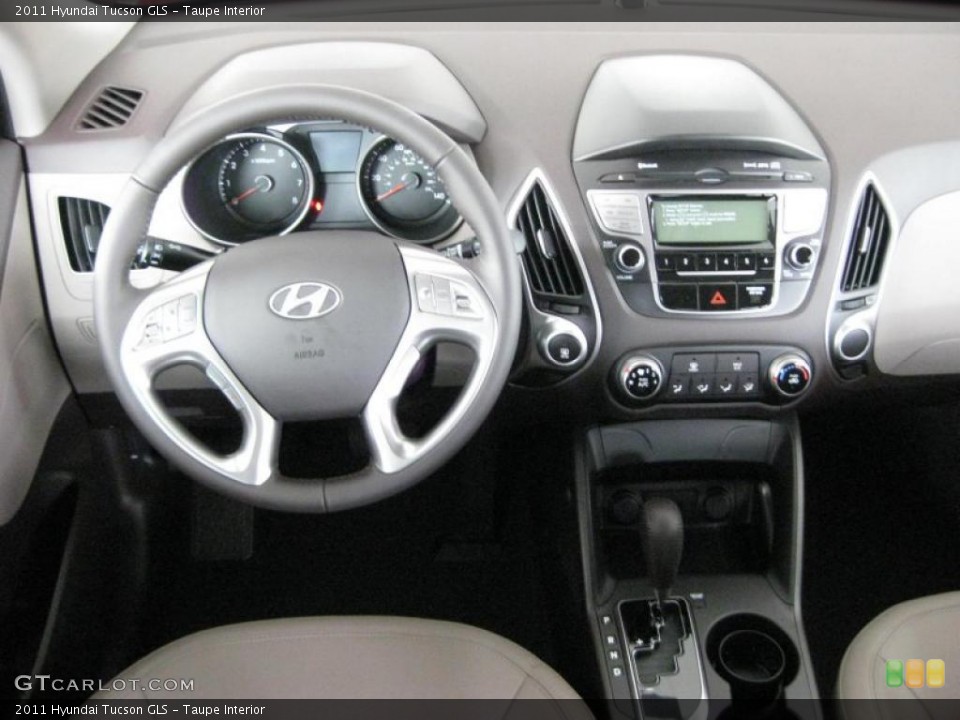 Taupe Interior Dashboard for the 2011 Hyundai Tucson GLS #45371518
