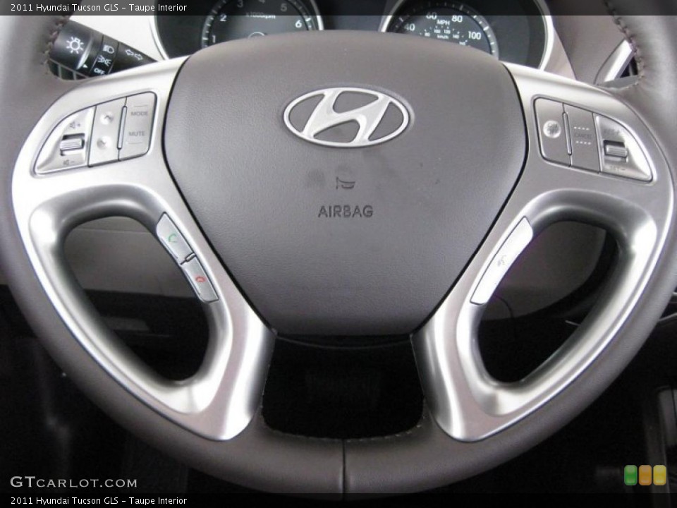 Taupe Interior Controls for the 2011 Hyundai Tucson GLS #45371542