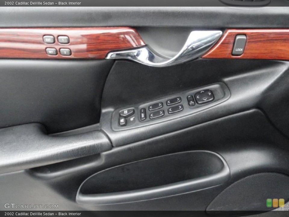 Black Interior Controls for the 2002 Cadillac DeVille Sedan #45372596