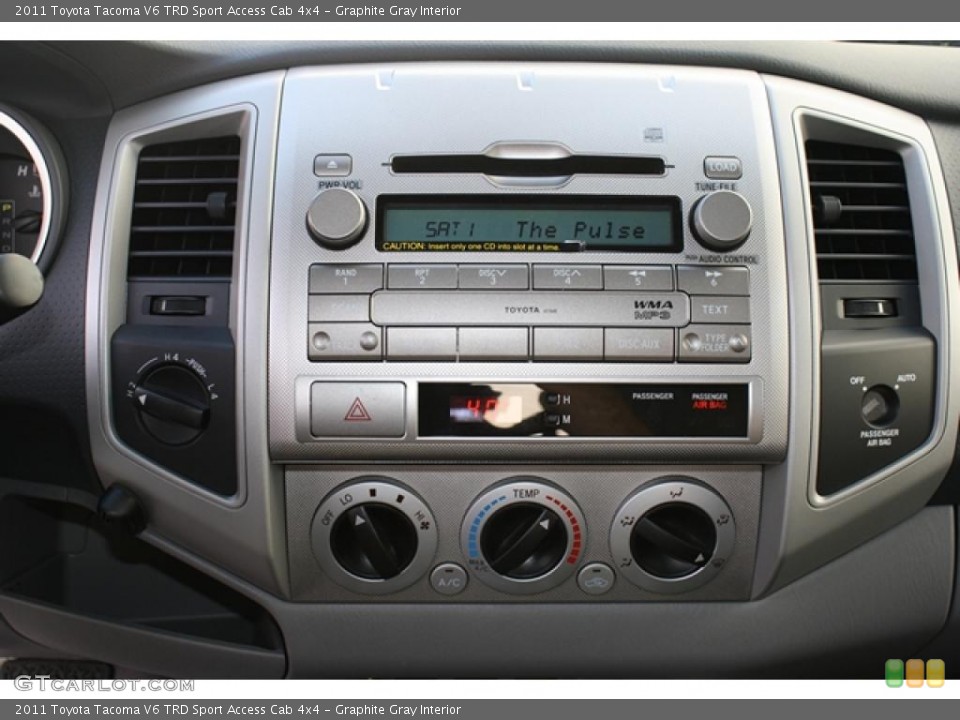 Graphite Gray Interior Controls for the 2011 Toyota Tacoma V6 TRD Sport Access Cab 4x4 #45411965