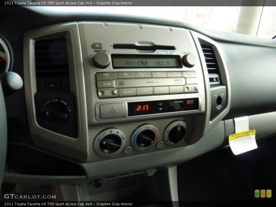 Graphite Gray Interior Controls for the 2011 Toyota Tacoma V6 TRD Sport Access Cab 4x4 #45443663
