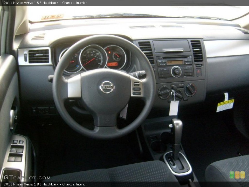 Charcoal Interior Dashboard for the 2011 Nissan Versa 1.8 S Hatchback #45454376